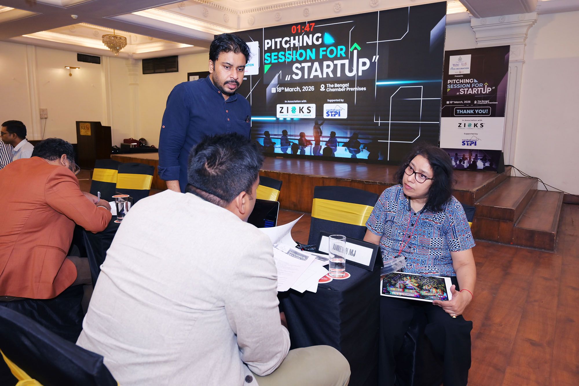 one-on-one conversations and consultation at the pitching session